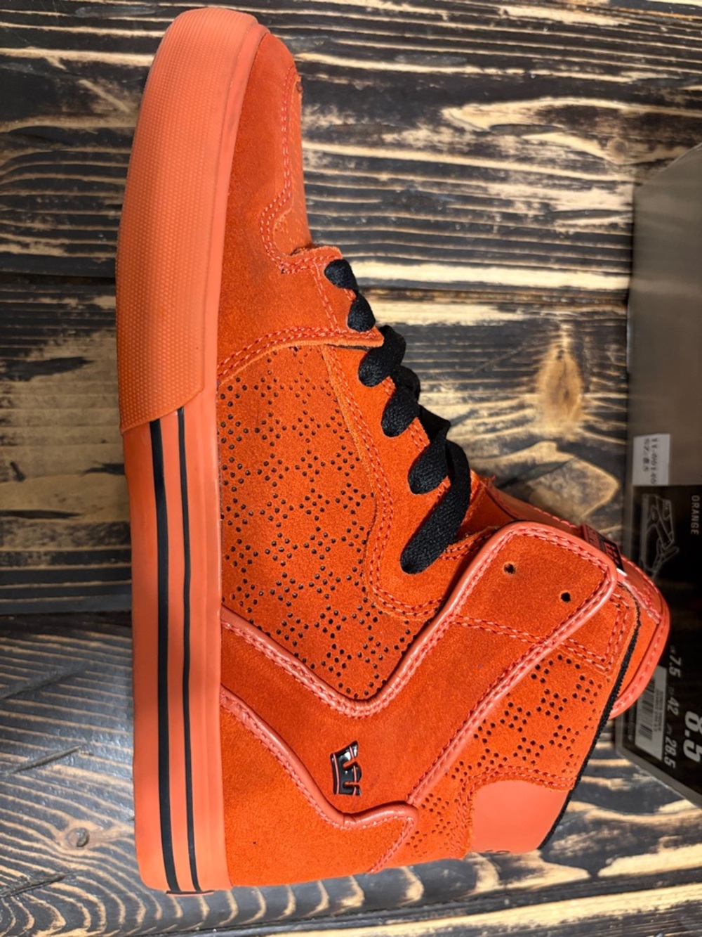 Supra Men's High-Top Sneaker in Orange with Black Laces